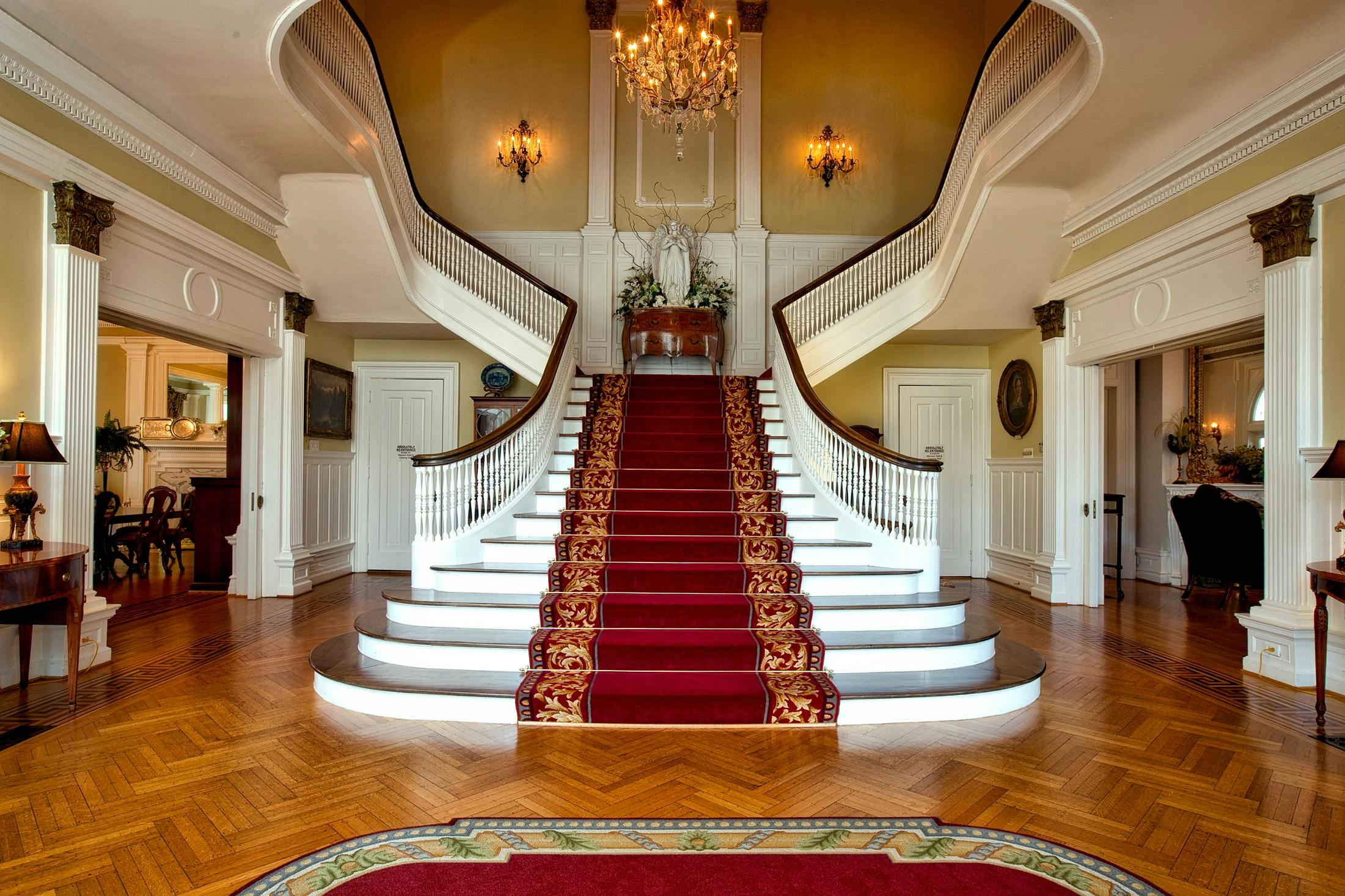 Elegant and opulent palace interior with chandeliers and lavish decor.